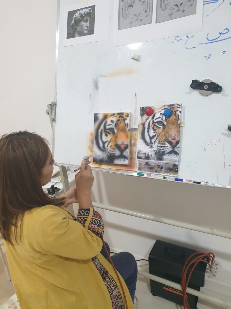 Christine completing the final stages of her first airbrush lession - 5 evening sessions after work - amazing