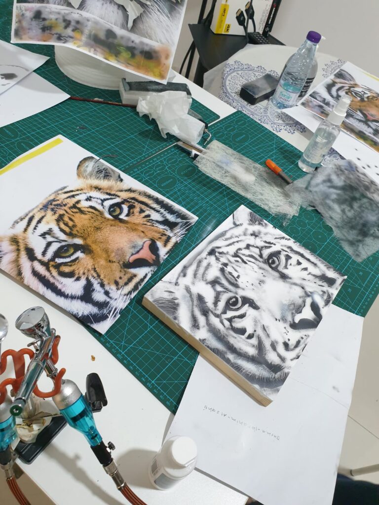 Maru preparing painting of the tiger - almost there for the colour!